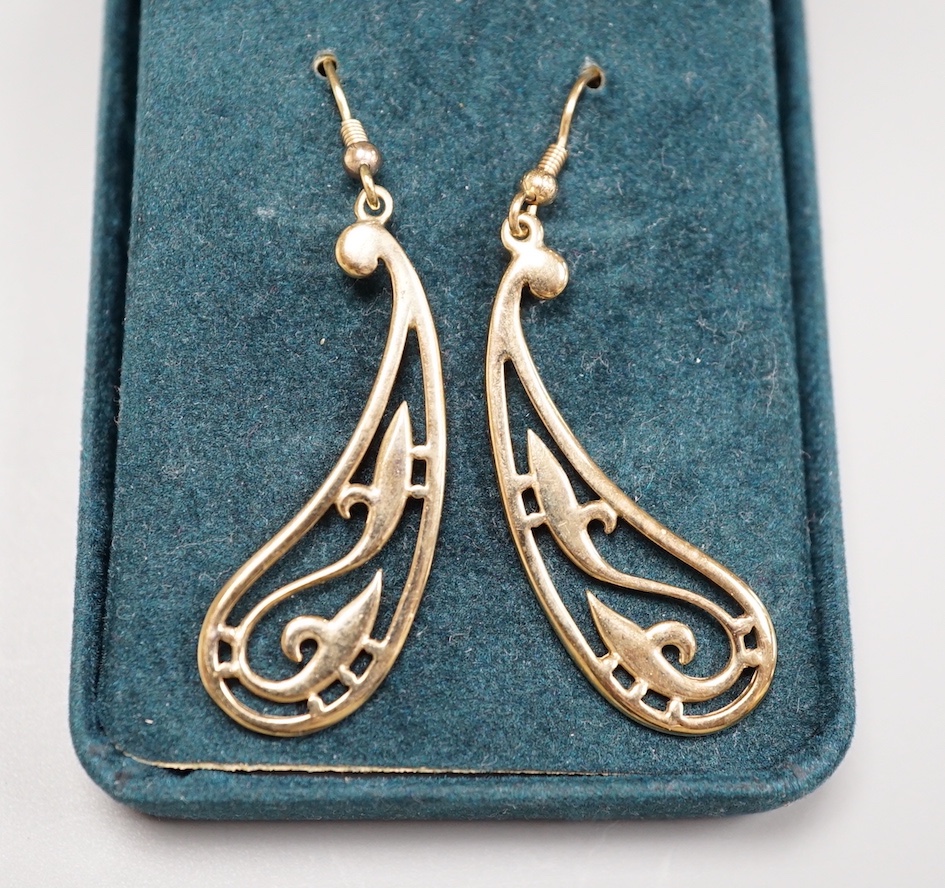 A modern 9ct gold pierced scroll drop earrings, 41mm, 6.1 grams.